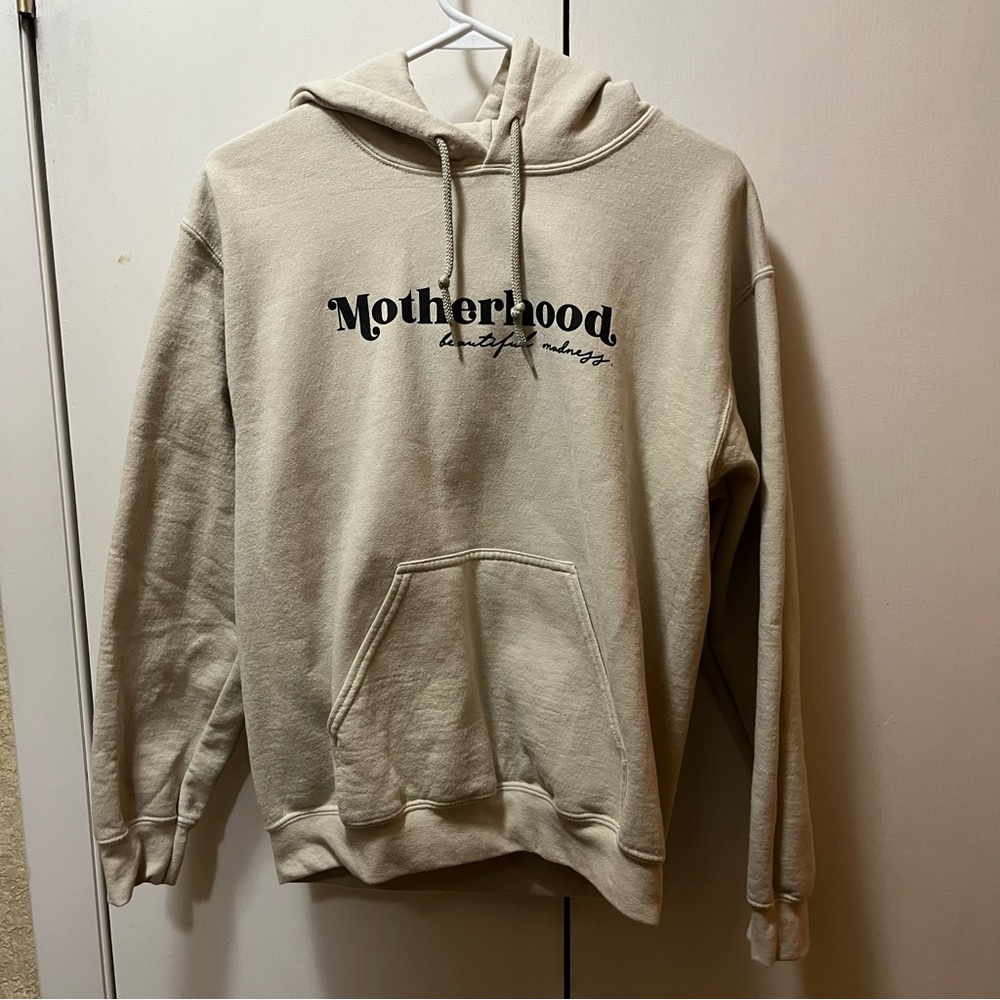 Cream Pullover Hoodie with ‘Motherhood Beautiful Madness’ Text